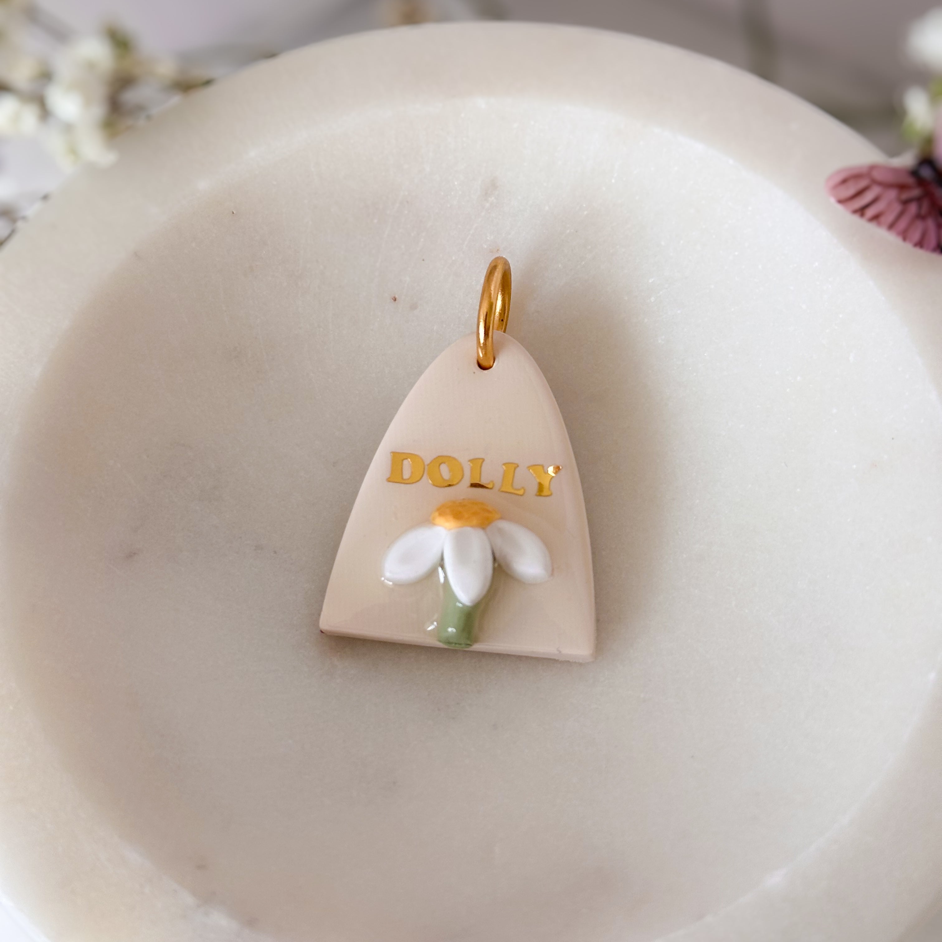 Triangular pet id tag with floral design 